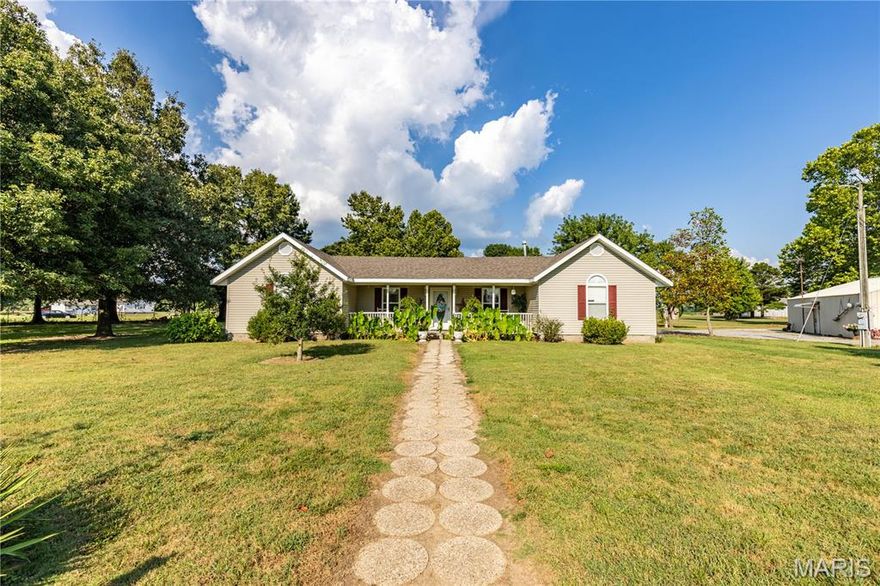 **Seller is offering a $7500 improvement allowance**
This beautiful property has so much to offer!  First thing is 2 for the price of 1!!  Yes that is right, you have a main home and a separate mother in law suite or apartment!  The 2 are connected by a breezeway but totally separate in regard to electric, septic, HVAC, and propane.  The main home has 3 bedrooms and 2 baths.  Open concept, with vaulted ceilings, divided floor plan and large rooms!  The detached suite has 2 bedrooms, 1 bath, open concept with a loft!  This home sits on 1.23 acres at the end of a cul de sac, but also has a private drive that connects it to Spanish Grant!  You will also notice there is a shop, multiple outbuildings, and a gas tank that will stay with the property!  With all of this why are you waiting to schedule your showing!!!  Call today!!!