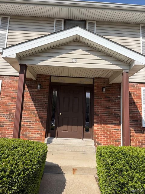 Photo of 1853 High Sun Drive, Florissant, MO 63031 (MLS # 26026096)