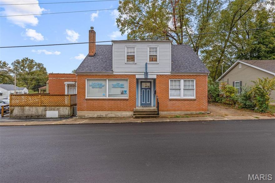 Imagine the exciting opportunity of having your office or business right next to your home, or even renting out the three bedroom living space! The office space has been most recently operating as a law firm and boasts an abundance of space, including a spacious front office area, a private office, a conference room, a large bathroom, and off-street parking. The living space which has just been updated with new flooring and painted throughout features three bedroom, a kitchen with a separate dining room, main floor laundry, a basement for extra storage, and a one car garage. This property is conveniently situated in historic Ste. Genevieve and just steps away from downtown!