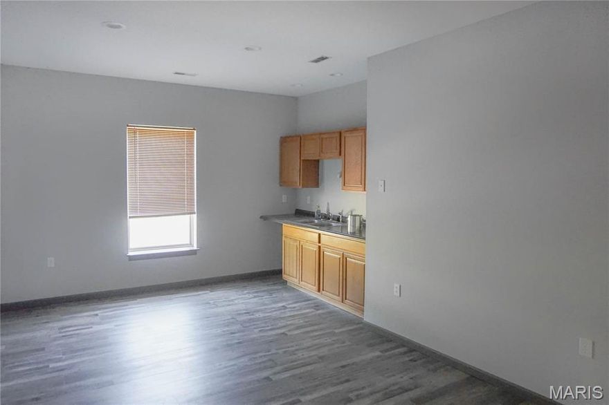 This updated 1,764 m/l sq ft office building offers flexibility with two separate suites that can remain divided or be combined into a single larger space. Located just one street off Hwy 63, the property offers solid visibility and easy access in a desirable commercial area. Zoned C-1 and situated on a 0.52 m/l acre lot, it includes 12 parking spaces and features modern interior updates. Whether for owner use or tenant occupancy, this property is also a strong investment opportunity to add to your commercial portfolio. Location: City