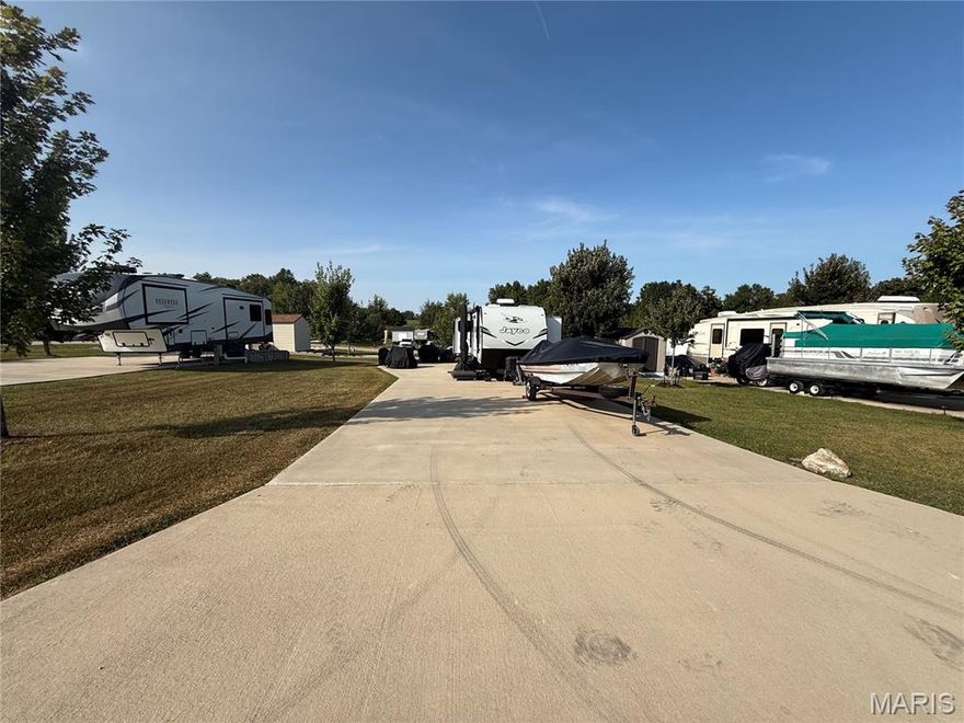 Discover your getaway spot at Adventure Out RV Park in Monroe City! This 50x100 paved lot #66 is ideal for your RV, offering plenty of room for setup, outdoor seating, and parking. With a paved surface, you’ll enjoy easy maintenance and convenience during your stays.
Adventure Out RV Park is open March through November, making it the perfect seasonal retreat near Mark Twain Lake. The park also provides maintenance services for your RV or camper right on-site. Enjoy fishing, boating, and all the local attractions just minutes away. Whether you’re looking for a weekend escape or a summer-long stay, this lot provides a comfortable, hassle-free base in a welcoming community. Camper & contents, not included.