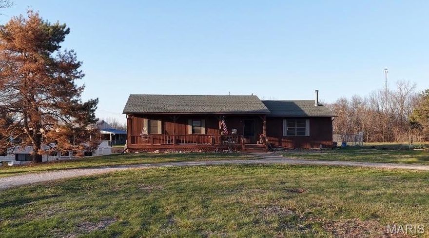 You cannot beat this location being close to town with 26.6 acres m/l!  This home was built in 1996 and offers 1680 square feet of living space on the main level.  Full unfinished basement with 2 car tuck under garage suggests possibilities of additional living space though currently is being used for ample storage.  Main level has been updated with new flooring, updated bathrooms, wood burning fire place in the living room and 3 spacious bedrooms.  The outdoor space is something to brag about starting with the screened in back porch overlooking the acreage.  28x50 shed currently being used for horses with chicken coop attached.  Property also offers an 18x30 shed with water and electric. Fenced pastures for horses, a pond in the back acreage, and plenty of wildlife for the the hunting enthusiast.  Come Check it out!