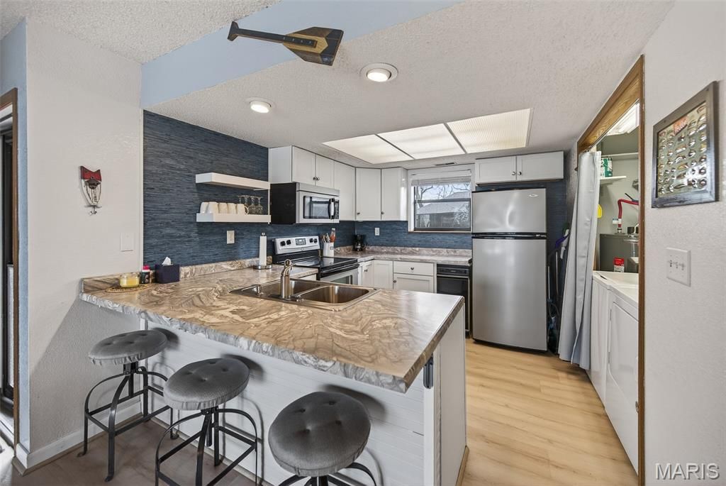 Photo of 256 Lone Oak #15, Sunrise Beach, MO 65079 (MLS # 26021169)