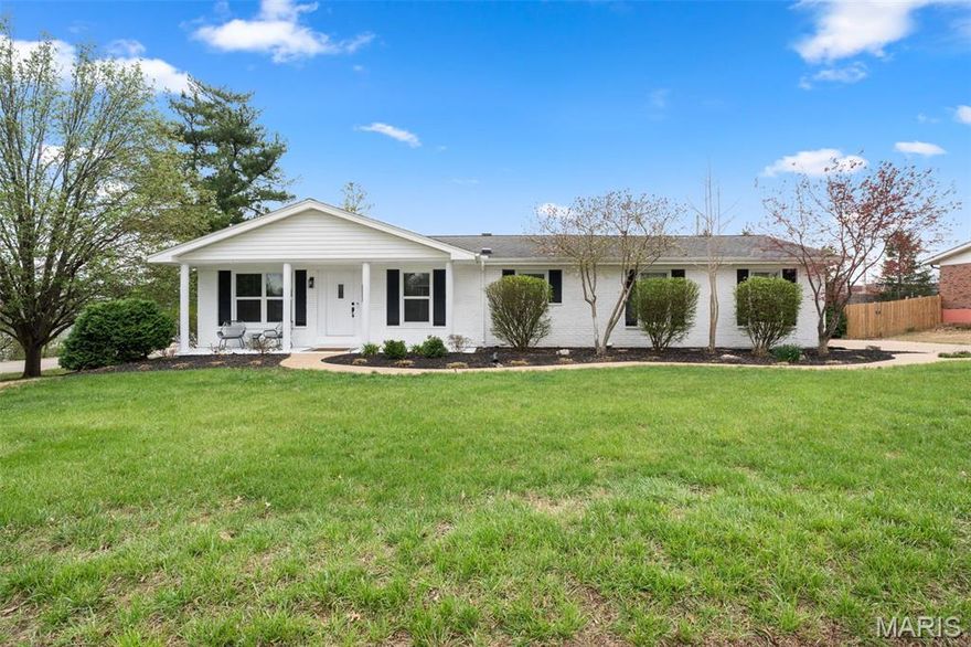 Updated 3 bed, 3 bath ranch that looks like it belongs in the pages of a design magazine! From the charming covered front porch and custom modern mailbox to the beautifully landscaped .328 acre lot, every detail hints at the style and quality you’ll find inside this one-of-a-kind home. Step into an open-concept layout offering nearly 3,000 sq ft of thoughtfully designed living space, highlighted by stunning hardwoods, beautiful LVP flooring, upscale fixtures, recessed lighting, stylish accent walls, and a cohesive color palette throughout. The heart of the home is the chef’s kitchen, featuring stainless appliances, white shaker cabinetry, classic subway tile backsplash, granite countertops, and a bright breakfast area that flows seamlessly into the inviting family room. A striking wood-burning fireplace creates a warm focal point, while French doors lead to an expansive rear patio perfect for indoor/outdoor living. The formal dining room showcases an incredible wall of custom built-ins & a refinished hardwood floor, and is a great flex space as your needs evolve – formal living room, playroom, home office. Main level also features three beautifully updated bedrooms, each with contemporary ceiling fans, fresh paint, and window treatments, along with two refreshed bathrooms. The spacious primary suite provides a private retreat with a luxurious en-suite bath. All bedrooms have hardwood floors under the carpeting! Continuing with the home’s modern aesthetic, the lower level offers additional rec and family space, laundry, a third full bath, and a private sleeping area ideal for guests or extended stays. Out back, the oversized patio overlooks a large, private corner lot with no rear neighbors, creating a peaceful setting for morning coffee or evening gatherings. Additional highlights include an attached 2-car garage and no HOA fees. Located in a highly desirable area, you’ll enjoy easy access to shopping, dining, and the scenic beauty of Ellisville’s network of eight connected parks and trails. All within the highly rated Rockwood School District!