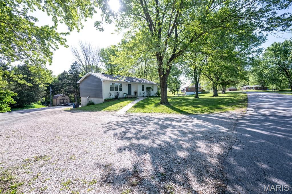 Photo of 5715 Dove Lake Road, Jefferson City, MO 65101 (MLS # 26024754)