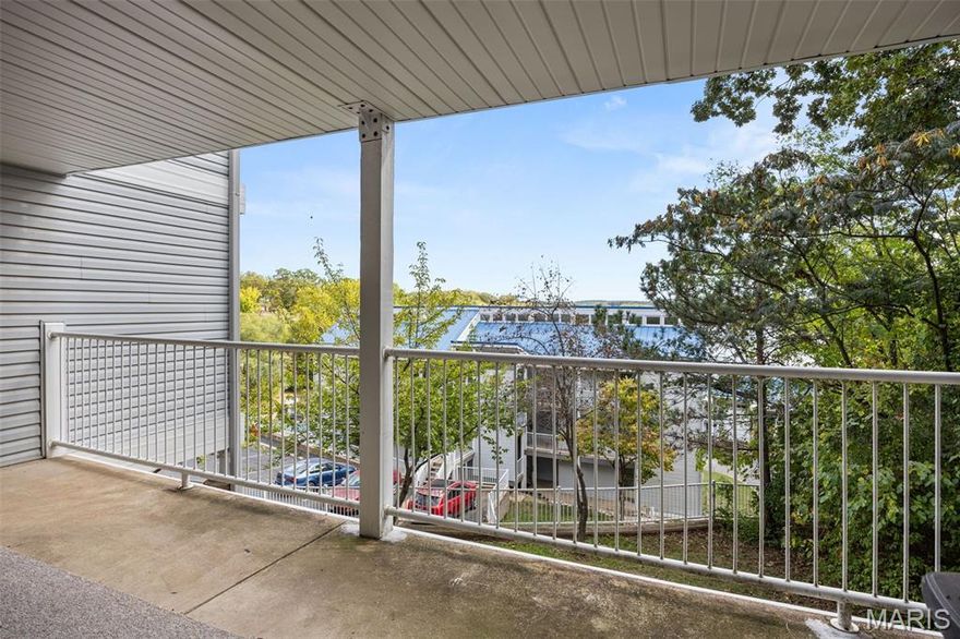 Stop searching and start living! Welcome to your move-in-ready sanctuary at Hawks Nest Lodge, perfectly positioned in the heart of Osage Beach at 1MM of the Glaize Arm. This isn't just a condo; it’s your front-row seat to the best of the Lake. This spacious 1BR/1BA walk-out level unit features a bright, open floor plan designed for the modern lake lifestyle. Updated with LVP flooring and sleek stainless-steel appliances, the interior exudes a fresh, contemporary vibe. Cozy by the fireplace on chilly evenings or enjoy the ultimate convenience of in-unit laundry and a walk-in pantry. Step outside to your large private deck to soak in beautiful lake views. The community perks are truly elite: Prime Lake Access: Cove-protected waters, a secured dock with a golf cart path, and a rare swim platform; Clubhouse: A social hub featuring a bar, game tables, ice machine, and extra laundry; Prime Location: Seconds away from top-tier dining, shopping, and vibrant marinas. Whether you’re hunting for a high-potential rental investment, a weekend getaway, or a full-time residence, this affordably priced gem is the one. Schedule your tour today—the lake is calling!