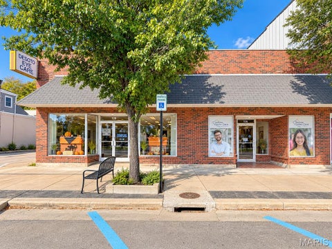 Photo of 126 S Main St ST, De Soto, MO 63020 (MLS # 26066639)