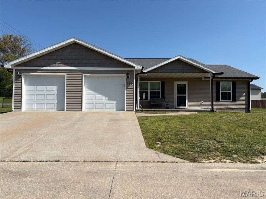 Three bedroom and two bath home on a corner lot in Hawks Landing featuring a split-bedroom floor plan and cathedral ceilings. Open-concept living, dining, and kitchen area with great natural light. Private primary suite and a true laundry room. Fenced backyard offers space for pets or entertaining. Functional layout, great curb appeal, and move-in ready. There is a $250 HOA fee per year that covers sewer and street lights.