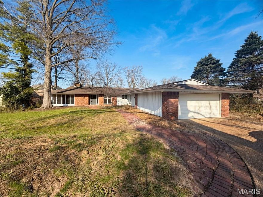 The fireplace serves as the central focal point of the living area at 565 Graeser Rd. The kitchen island provides ample workspace, complemented by stainless steel appliances. The primary bedroom contains a walk-in closet. Exterior amenities consist of a deck. Don't miss out on this unique opportunity. Included 100-Day Home Warranty with buyer activation