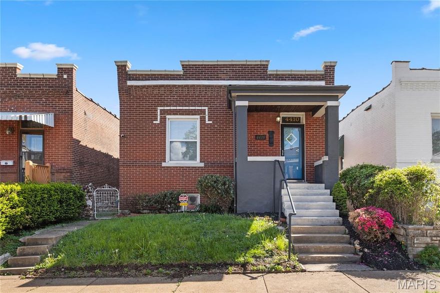 This South City charmer offers fantastic curb appeal and is ready for its new owners! Conveniently located near some of St. Louis’ best parks and restaurants, this home combines charm, functionality, and an ideal location.  Inside, you’ll find beautiful flooring throughout and a spacious living room featuring a gorgeous decorative fireplace. The separate dining room is perfect for entertaining, while the kitchen offers ample space and functionality with stainless steel appliances, garbage disposal, cast iron sink, pantry, ceramic tile flooring, and a breakfast bar with butcher block top and additional cabinetry below.  The updated bathroom features a stylish vanity that adds a modern touch, along with a shower/tub combo with a subway tile surround and glass shower doors. The primary bedroom features a rare walk-in closet—an uncommon find in a city bungalow. The second bedroom also offers a spacious closet for additional storage.  Additional highlights include ceiling fans in the living room, kitchen, bedrooms, and bonus room. The bonus room is filled with natural light and can serve as an additional bedroom, office, or playroom.  The walkout basement is dry and provides extra storage space, includes a washer and dryer, and offers great potential for a rec. room/family room, playroom, workout area, etc.  A security system with cameras included for added peace of mind.  Outside, enjoy a level, fenced backyard with a fire pit, a detached one car garage, and beautifully constructed gem and mineral mortared retaining walls. The property has passed the Stl municipal occupancy inspection and is move-in ready.  This property may qualify for a $2,500 homebuyer grant. Eligibility is subject to buyer qualification and program guidelines. Contact listing agent for more information.