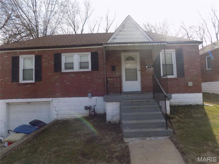 Nice 2 bedroom with a 1 car tuck under garage , big back yard , newer furnace and water heater,