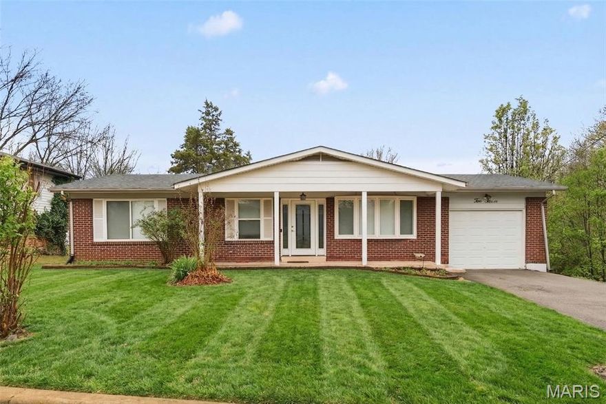 An absolute CHARMER in Rock Hill within the highly sought-after Webster Groves School District minutes away from shopping, restuarants, and parks! This beautifully updated Ranch is the perfect blend of character, functionality, and modern touches that offers the everyday comfort you've been dreaming of!  As you enter be welcomed by warm hardwood floors of the living room brightly lit with tons of natural light from the large window! It opens into the dining area with a custom breakfast bar and a picturesque corner wood-burning fireplace! Continue into the kitchen that boasts granite countertops, stainless steel appliances and beautiful antique white cabinets featuring gas stove, microwave, dishwasher, & refrigerator! Main level is completed by two spacious bedrooms and a gorgeously updated full bath with a granite dual vanity and a custom tiled shower! The finished lower level offers valuable additional living space with a custom bar, perfect for a Recreation room, Mancave, media room, theatre room - You choose! Additional sleeping area for guests or virtual work from home office! Outside, you will love the backyard setup with a screened-in patio and sunroom, creating a great place to relax or entertain all spring and summer. Updated, move-in ready, and in a location people love, this home checks all the right boxes! Gems like this don’t come around often. Schedule your showing today!