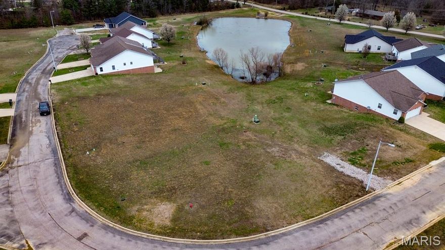 Prime Building Lot in Mallard Pointe Subdivision An exceptional opportunity awaits in the sought-after Mallard Pointe Subdivision just outside the Poplar Bluff city limits. This lot is ideal for a basement home with gently sloping grad for immediate construction. Whether you’re a builder looking for a home site or a buyer seeking a lot in a growing community, this location offer outstanding potential. Located near shopping, medical facilities, and local amenities, Mallard Pointe combines convenience with the comfort of a well-planned neighborhood. As part of the Planned Urban Development HOA, residents enjoy lawn care, trash service, seasonal and road maintenance, and private lake access. Utilities including public water, sewer, electric, and fiber optic internet are stubbed up and ready to connect. With several new construction homes already completed in the subdivision, this is an ideal investment in a thriving, well-maintained community. Bring your vision—this lot is ready for your next project!