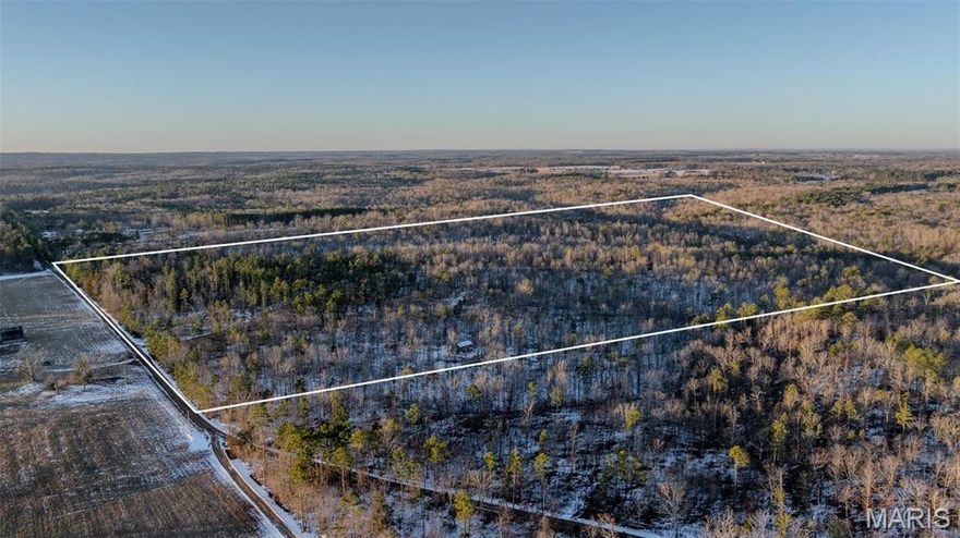 This 80 +/- acre tract is the southern half of a 160 +/- acre property with access off Huldy Drive on the east side, less than 5 miles from Raymondville, MO. The property runs primarily east and west and features rolling topography with timbered ridges and pocket ravines.
A well-maintained trail system provides side-by-side and ATV access throughout the property. The west end includes a wet-weather creek and scenic bottom area that enhances wildlife habitat and recreational value.
A small unfinished cabin with a rainwater collection system is already in place, making this an ideal setup for a hunting camp or weekend retreat. Electric runs along the eastern boundary for future expansion.
This tract offers a turnkey recreational property with strong hunting and development potential. The north and south tracts may also be purchased together for a full 160 +/- acre package.