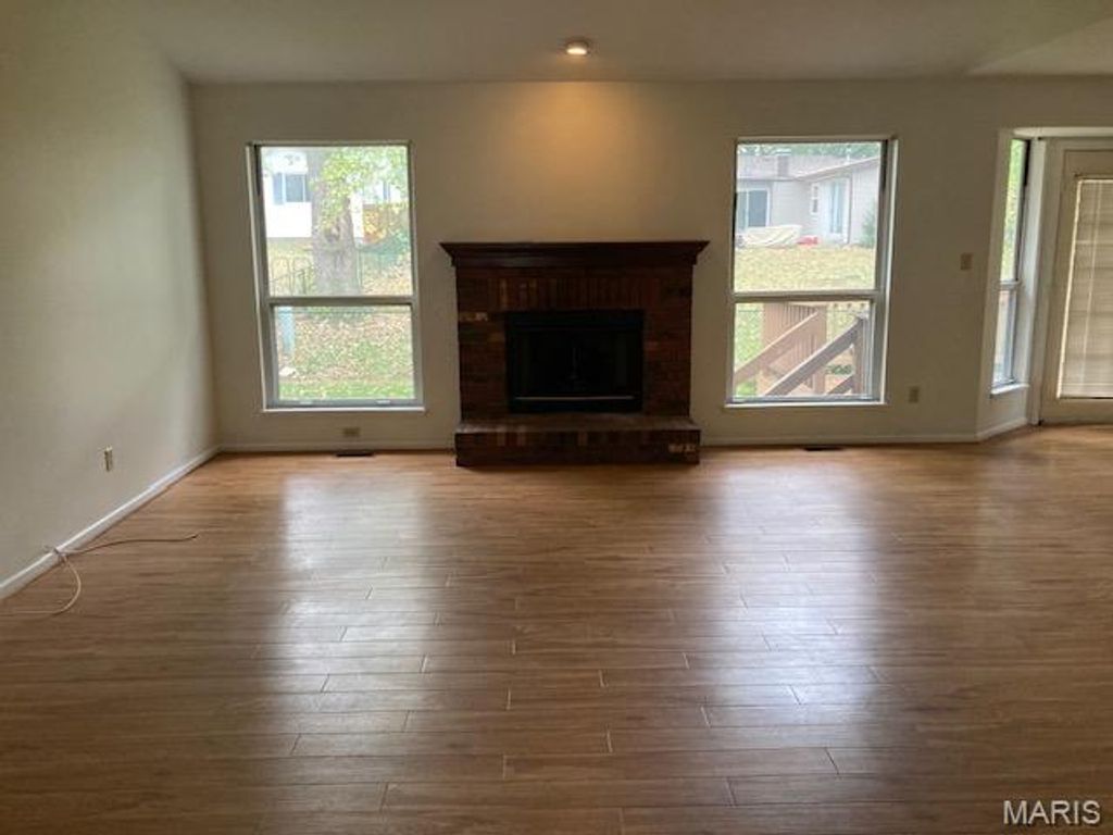 Photo of 1661 Cobblestone Creek Drive, Florissant, MO 63031 (MLS # 25072931)