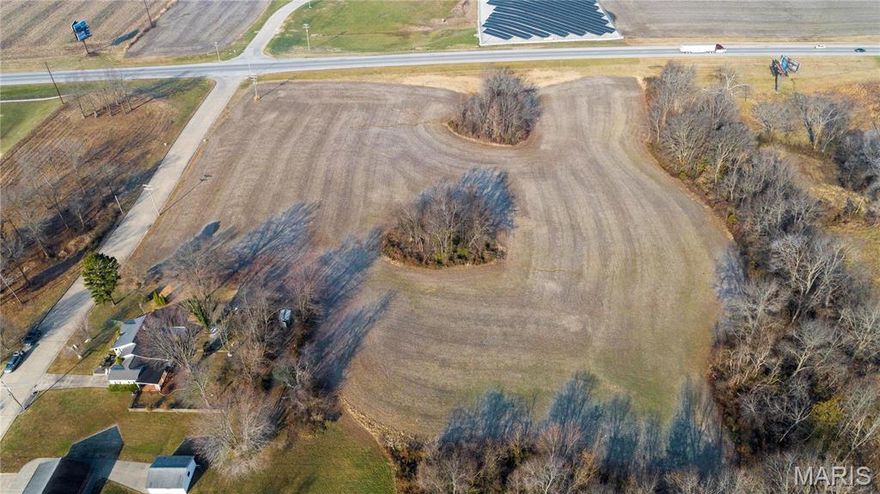 9.36 acres of prime commercial land with high traffic visibility. Zoned C2 which means the possibilities are endless for development. City utilities are available.
