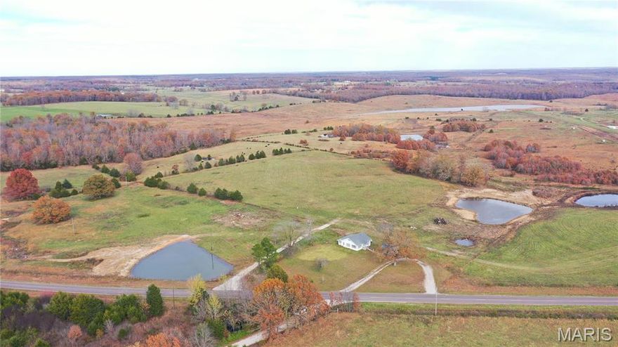 Welcome to your dream cattle farm! This expansive property spans 239 acres m/l with mostly open pasture is fenced and cross-fenced with 15 separate pasture areas for rotation. With 6 ponds scattered across the landscape, your animals will have ample access to water sources plus the farm is equipped with 10 Stewards concrete waterers strategically placed throughout, providing convenience and efficiency in watering your cattle. Currently serviced by a drilled well on the adjoining property, buyers will have the opportunity to use the well for one year from the closing date. Subsequently, a new well will need to be drilled to ensure continued water supply for the waterers. 1940 farm house has 3 bedrooms and 1 bath. HVAC system and a new roof 2019. Detached carport. Drilled well and lagoon. Located near Jadwin, MO, and not far from the famous Current River for trout fishing, kayaking and canoeing, Big Rock Candy Mountain, Flat Nasty Off Road Park and Montauk State Park. CALL TODAY!