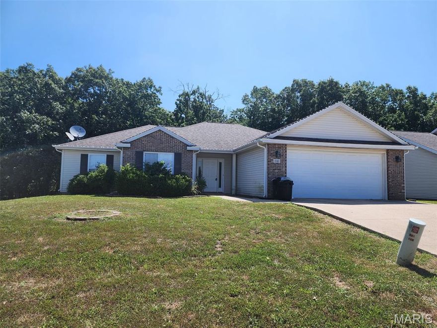 Looking for 1 level living close to Ft. Leonard Wood and in the Waynesville school district, this home is for you!  This 4 bedroom, 2 bathroom home features open floor plan with vaulted ceilings, kitchen island with plenty of counter space, and an oversized laundry room.  The master has double vanity and walk-in closet and a new HVAC system was installed September 2024.   The home backs to the woods with a private patio perfect for enjoying the fall evenings.