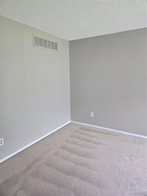 Tiny photo for 6813 Coachlight Square Court, Florissant, MO 63033 (MLS # 26042082)