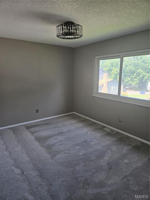 Tiny photo for 6813 Coachlight Square Court, Florissant, MO 63033 (MLS # 26042082)