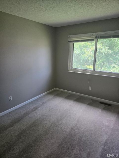 Tiny photo for 6813 Coachlight Square Court, Florissant, MO 63033 (MLS # 26042082)