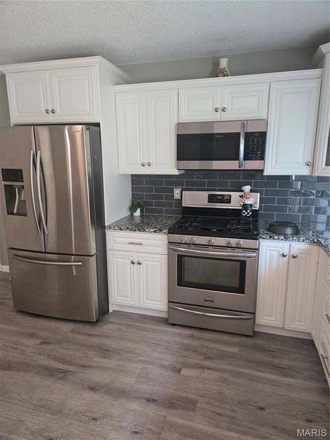 Tiny photo for 6813 Coachlight Square Court, Florissant, MO 63033 (MLS # 26042082)