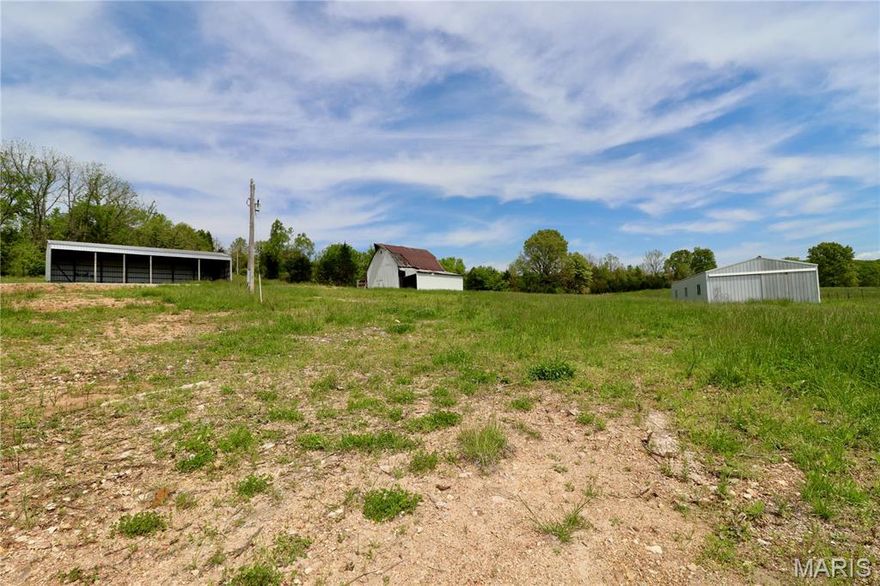 This beautiful, cleared 3.06-acre parcel is the perfect canvas for your dream home in the peaceful countryside of Grovespring, MO. The property includes a metal utility building ideal for storage or workshop space. A large lean-to adds even more covered space, perfect for equipment, vehicles, or livestock shelter. You'll also find a charming older barn—still functional and full of character—that could be brought back to life with a few repairs. Whether you're looking to build, homestead, or simply enjoy a quiet rural retreat, this property offers a solid foundation to make it happen. Located just a short drive from Hartville, you'll enjoy the convenience of nearby schools, shopping, and local amenities, while still savoring the peace and privacy of country living. Outdoor enthusiasts will love the proximity to Mark Twain National Forest, fishing at area creeks and rivers, and scenic Ozark views all around. This rare opportunity won't last long—come see the potential for yourself today!