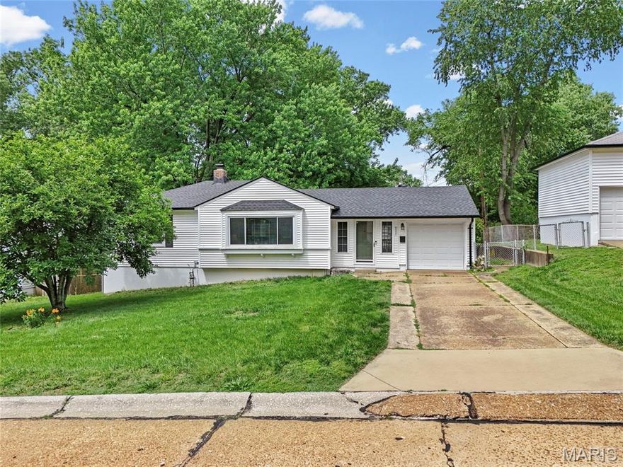 Welcome to 9557 Cantwell Drive in Affton. This 2 bed, 2 bath home comes with an attached garage and has key updates already handled. The main floor offers a spacious entry foyer with flexible sitting space and french doors leading to the deck and fenced, level backyard. The living room is bright and welcoming, with a wall of windows and natural light. The kitchen provides plenty of counter space and cabinet storage, with all kitchen appliances included. A dining room, two bedrooms, and a full bath complete the main level, with hardwood and ceramic tile throughout. The finished lower level adds even more room to spread out with a rec room, a flexible bonus space with a large walk in closet (that could be used  an office) another bonus room, full second bath, plus a washer and dryer that stay. Outside, the level fenced yard offers plenty of room for entertaining and for the pets to run. Updates include a new roof and gutters in 2025, new water heater in 2024, and newer windows throughout.