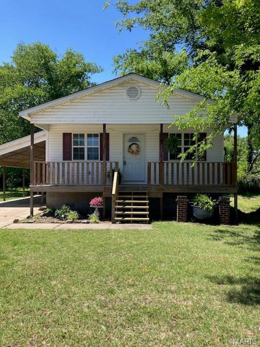 SELLER WILL PAY $1000 IN SELLER CONCESSIONS FOR A READY AND WILLING BUYER! Spruced up and ready for a NEW OWNER! Take a look at this nice, clean, move-in ready home sporting a NEW ROOF! The charming front porch leads to an open living, kitchen & dining area. Primary bedroom with 3/4 bath, two additional bedrooms, one full bath and a one car attached carport, a 12x24 storage shed with walk-in door and garage door. This is the perfect size for a starter home or someone ready to downsize. Come and see for yourself... adjacent lots are available if interested.