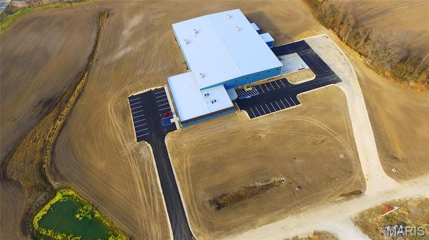 For Sale or Lease. Calling all businesses! Great Opportunity in a city that wants new business here! Perfect place to call home for a new or expanding operation, this 37,523sq ft facility can accommodate almost any venture! Sitting on almost 12 acres, the building consists of over 29,000 sq ft of heated warehouse/ manufacturing space along with 8,500 sq ft of office space including a reception area, conference rooms, break room, and several private offices. Building is serviced by 500 KVA 3 Phase 2000 AMP 277/480 Volt electric, natural gas and public utilities making it ideal for manufacturing, fabrication shop, indoor growing or anything else that you have in mind! Warehouse/manuf. space features 4 semi-height loading docs, pick-up height dock and 2 full drive-in doors. Property adjoins Kansas City Southern railway line, and is in close proximity to US-54, US-61 and is within 60 Miles of Interstate 70. The large lot allows for future expansion. Floorplans available upon request. Some Accessible Features Location: Corner Location, Hwy/Interstate Frntg, Industrial Park, Industrial Area, Rural