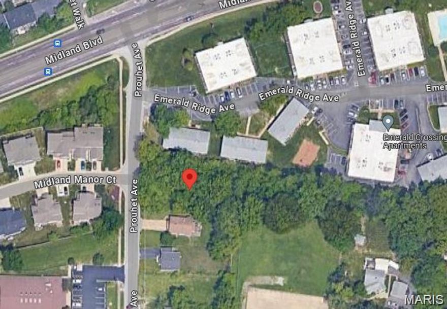 Exceptional development opportunity on this prime .26-acre vacant lot zoned for duplex or attached villas. Situated in a desirable unincorporated area near Maryland Heights, this property features approximately 81 feet of road frontage and is surrounded by established residential communities. The lot backs to existing apartments, is flanked by a duplex, and sits directly across from a popular attached villa subdivision with recent sales starting at $205,000+.

Utilities including water, sewer, electric, and gas are available at the street (buyer to verify). Ideal opportunity for investors or builders seeking a ready-to-develop site in a growing area.