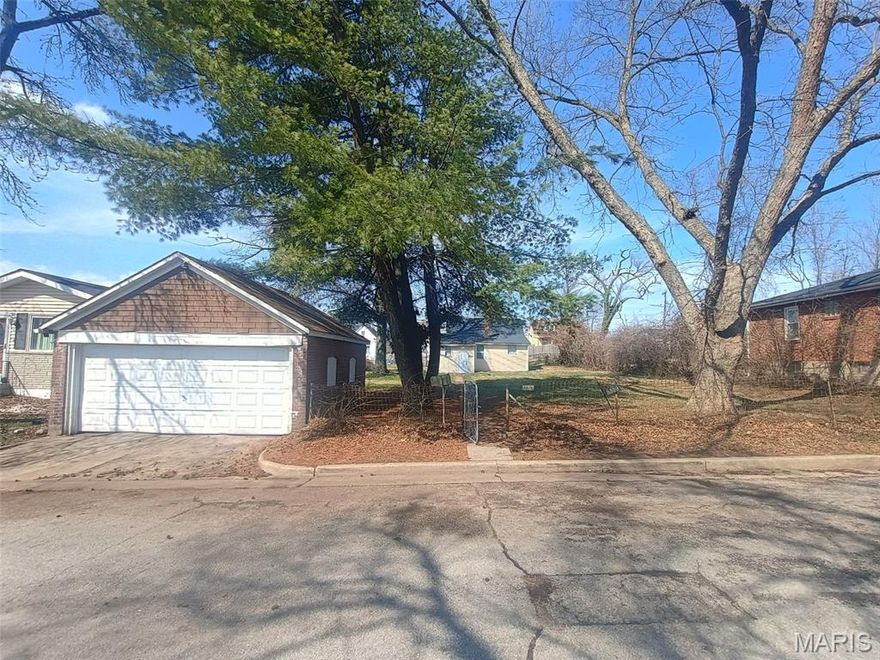 This move in ready 2 bedroom home just passed occupancy and is ready for its new owner! The property is a great package, with a 2 car all brick detached garage and HUGE private front yard on nearly a quarter acre! The house has new luxury vinyl plank flooring throughout and a remodeled kitchen with new stainless steel appliances. Other recent updates include paint and doors throughout and an updated bathroom. Plenty of storage in the full height walk out basement and detached garage. Additional photos coming soon. Great starter house or turn key cash flowing rental!