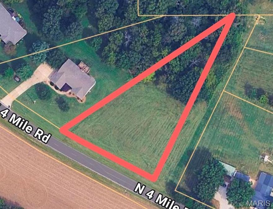 Looking for that perfect place to build your new home? This 1-acre lot in Cobblestone Creek offers the perfect balance between peaceful country living and the benefits of being just a short distance to town with shopping, restaurants, entertainment and more.  Located directly off Four Mile Road the lot is cleared in the front and has mature trees lining the back of the property.   Enjoy fishing the 4+ acre, stocked lake or just strolling around it.  Restrictive covenants protect your investment.  Don't Miss This One!