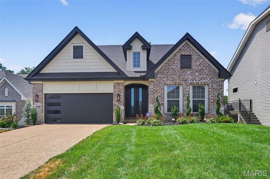 Nestled within the esteemed Grand Reserve Court in Chesterfield, this single-family residence offers an exceptional living experience with a contemporary design that embraces modern comfort. No corners were cut in the building process. Exterior features include Decorative Brick & Stone, Hardie Siding, Black Facia & Soffit, Upgraded Garage Door, Floor-to-Ceiling Front Door, Extensive Landscaping with Retaining Wall, French Drain, Sprinkler & Drip System, Flagstone Patio, and Covered Screened Porch. The wow factor when you step inside will take your breath away. Interior features include Hardwood Flooring & Upgraded Carpeting, Dreamy Bathrooms, Designer Paint, Window Tinting, Custom Shades & California Closets. The showstopper kitchen boasts Sleek Floor-to-Ceiling Black Cabinetry, Quartzite Countertops, Energy-Efficient Appliances including Sub-Zero Wine Cooler, Double Oven, Gas Cooktop with Hood, Large Island with Breakfast Bar, Lighted Pantry with Pull-Out Shelves & Breakfast Room with Wine Bar. The Great Room features a Floor-to-Ceiling Porcelain Wall with Gas Linear Fireplace & Blower. The Primary Suite has Hardwood Flooring and a stunning Bathroom with a 4x6 Walk-In Shower. An additional Main Floor Bedroom has its own private bath and walk-in shower. The Lower Level offers a spacious living or rec area, plus a large bedroom & full bath for guests. This home’s features must be seen to be fully appreciated!