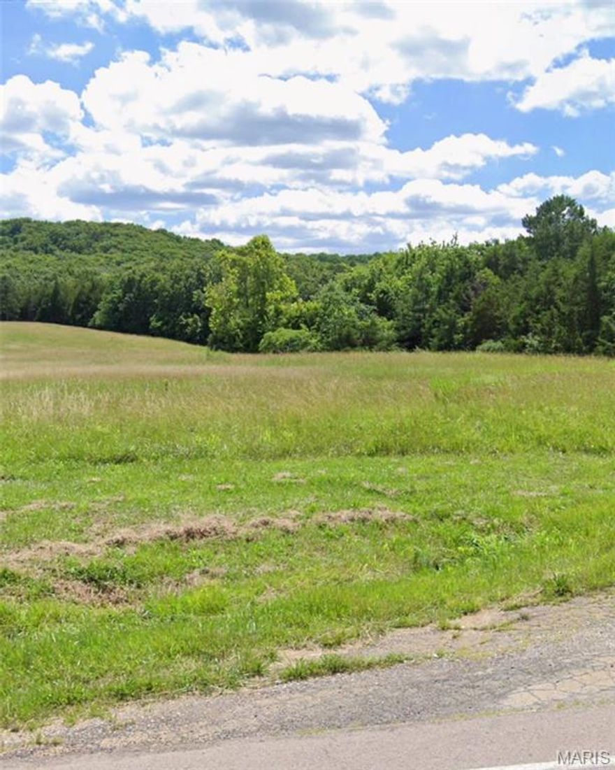 Nestled between the welcoming communities of Park Hills and Farmington, this 4.42-acre parcel presents a rare, dual-use opportunity in a highly accessible corridor. The site’s flat to gently rolling terrain provides a versatile canvas for a thoughtfully designed development that blends commercial space with residential appeal—think a small mixed-use complex, live-work storefronts, or a residential development with commercial frontage. Easy highway access delivers standout visibility for commercial uses while offering convenient commuting for residents, employees, and customers. The surrounding area combines growing demand with a serene, low-traffic setting, creating a balanced environment ideal for a variety of concepts—from professional offices and retail to single- or multi-family housing, tucked into a cohesive plan that leverages open space and natural surroundings. Surrounded by developing infrastructure and nearby amenities, this land invites innovative possibilities where commercial activity and residential living can thrive together—driving value today and long-term growth for tomorrow.