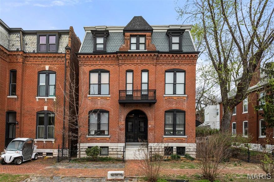 Updated 4-bedroom, 2.5-bath townhouse-style home in the heart of historic Soulard, complete with a 2-car garage and finished lower level.  4 levels of living.   Tucked behind a charming side-yard entrance, this home offers a private fenced backyard with patio, plus a spacious deck off the kitchen—perfect for entertaining.  Meticulous maintained home.
Inside, you’ll find timeless character blended with thoughtful updates, including hardwood floors, pocket doors, paneled doors, white historic trim and moldings, two decorative fireplaces, ornate dining room ceiling, extensive upgraded lighting and fixtures, freshly painted interior, closet built-ins, and so much more. The kitchen features custom cabinetry, granite countertops, and stainless steel appliances 2020  The spacious primary suite offers abundant closet space and convenient laundry, while a rear bedroom on the second floor makes an ideal home office. The third floor includes two additional bedrooms and a tasteful full bath, giving the home plenty of flexible living space. Zoned HVAC adds comfort and efficiency. Upstairs furnace 2026 Major updates include new side and rear windows in 2023 and tuckpointing completed in 2025. White TPO roof w/25 year warranty 2020.  Stairs carpet 2021 along with LTV one the second and third floor   Enjoy all that Soulard has to offer just outside your door—restaurants, shops, bars, Soulard Market, and Anheuser-Busch are all within walking distance. Known as the Community of Gardens, Soulard is also home to the beloved French Dog Park. 100 steps to Vincent's Market, which the sellers hate to leave.