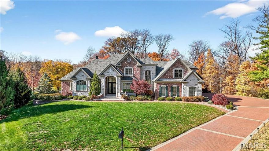 MOVE RIGHT INTO THIS DRAMATIC BOZICH BUILT ESTATE ON QUIET CUL DE SAC.  GRAND ENTRANCE WITH DOUBLE DOORS AND MARBLE FLOORS SETS THE STAGE FOR AN ELEGANT, BUT PRACTICAL LIFESTYLE.  STUNNING LIVING ROOM WITH FLOOR TO CEILING WINDOWS OVERLOOKS AN IMMACULATE BACK YARD AND 12TH GREEN OF BELLERIVE COUNTRY CLUB.  GOURMET, EAT IN KITCHEN HAS GRANITE COUNTERTOPS, WOLF APPLIANCES, SPACIOUS CENTER ISLAND AND WET BAR WITH WINE COOLER.  COZY HEARTH ROOM WITH STONE FIREPLACE LEADS TO COVERED PATIO WITH AN ADDITIONAL FIREPLACE FOR COOL FALL AND SPRING EVENINGS.  MAIN FLOOR MASTER HAS FIREPLACE, FIVE WINDOW BAY AND LUXURIOUS BATH.  FOUR ADDITIONAL BEDROOMS AND BATHS UPSTAIRS, SAUNA AND MEDIA ROOM IN WALKOUT LOWER LEVEL,  FOUR CAR GARAGE, BRICK AND STONE DRIVE AND MANY MORE EXCITING AMENITIES COMPLETE THIS FINE HOME.  DON'T MISS THIS OPPORTUNITY TO LIVE IN PRESTIGIOUS MUIRFIELD NEIGHBORHOOD!