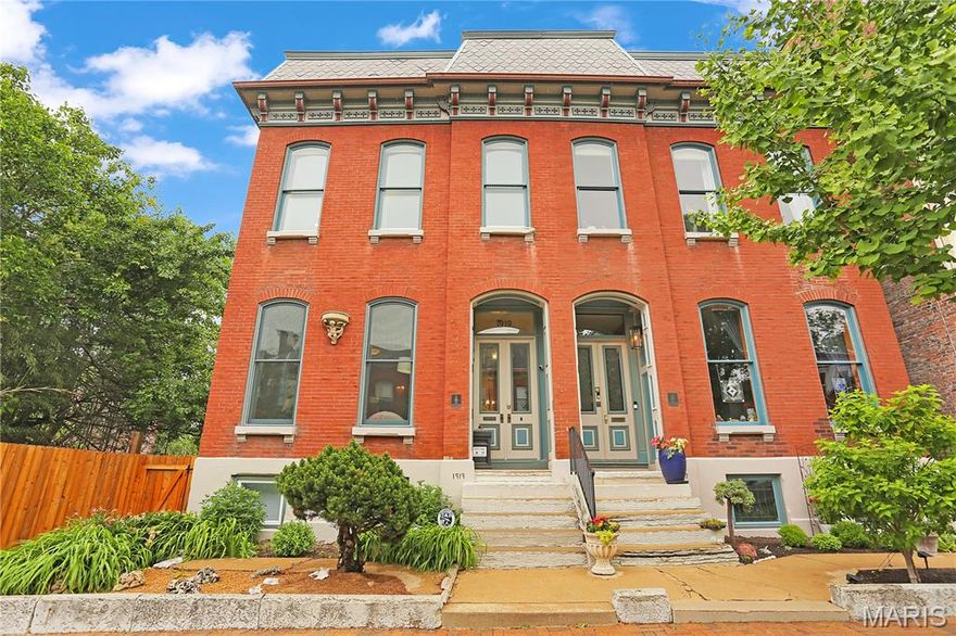 Welcome to a rare find in Historic Lafayette Square. Located on a sought after street known for it's beautiful "Painted Ladies", this home has been meticulously cared for and improved with all newer roofs, zoned HVAC systems, upgraded kitchen and newer decks. A rarer find is the 2 car attached heated & cooled tandem garage and 1 additional space off the alley. Something unheard of in this neighborhood. The main floor features a large living room and dining room separated by working pocket doors. Hardwood floors are found throughout the main and 2nd levels. Soaring ceilings and historic moldings are everywhere. The main floor rear area is a huge kitchen with tons of cabinets open to the family room which had an 8' tall sliding door onto the large deck for entertaining. Beyond the deck is another large storage room, perfect to over-winter plants and pots. The spacious primary suite features, a dressing room with two huge closets, a laundry and separate bath ensuite. There are two additional bedrooms and a large hall full bath on this floor. The 3rd floor is one large attic space for storage and systems. The lower level at grade is the garage, large mudroom / laundry area, utilities room, and then a large open rec room with a 2nd kitchen area and a large full bath. There is a bonus room currently used as a guest bedroom. Having a 2nd exterior entrance, this area would make a terrific suite for inter-generational living. A narrow side yard makes for additional outdoor living space or a convenient space for the pooch to run. Enjoy the Summer Concerts in Lafayette Park, walk to restaurants and bars, and enjoy being 15 mins to everywhere! Convenient to SLU, The Cortex, Mid-town, and downtown. Don't miss this home in your search!