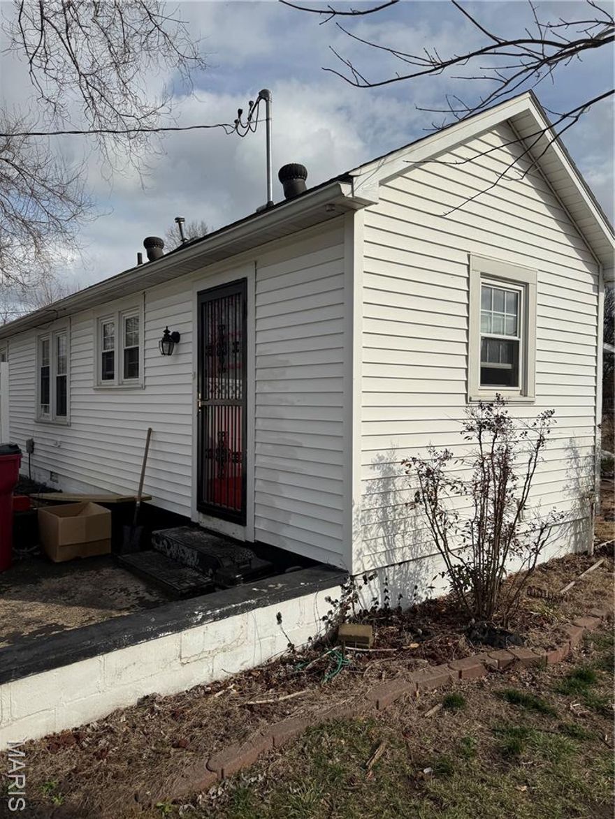 TWO BEDROOM HOUSE LOCATED ON A LARGE CORNER LOT WITH 3 EXTRA VACANT LOTS INCLUDED, ALONG WITH TWO DETACHED SHOPS