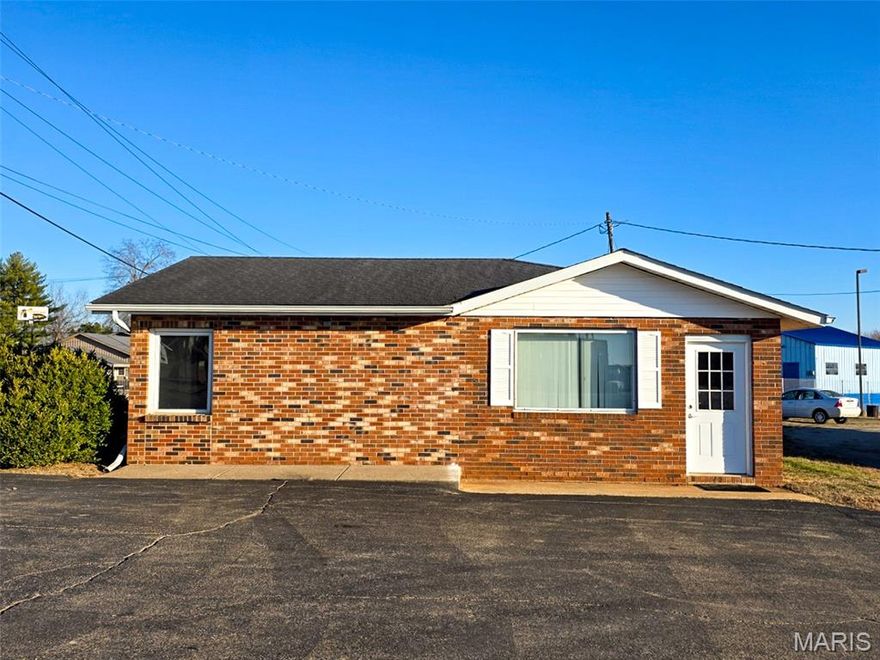 Prime commercial opportunity in a high-traffic area offering excellent visibility and easy access. Positioned near grocery stores and several popular dining establishments, this property benefits from steady daily traffic and strong exposure, with close proximity to the roadway for maximum visibility. This full-brick building features a durable, low-maintenance exterior and affordable operating costs, making it an attractive option for both owner-occupants and investors. Though modest in size, the efficient layout makes excellent use of space. Previously configured as office space, the interior allows for multiple private offices or the potential to be divided into separate units for rental income. The flexible layout would easily accommodate a variety of business types, including a Salon or barber shop, tax preparation, accounting office or other professional services. In recent years, the community has experienced strong growth and continued support for locally owned businesses, creating an encouraging environment for entrepreneurs and investors alike. This property offers the opportunity to establish or expand your presence in a town that values and supports small business success.