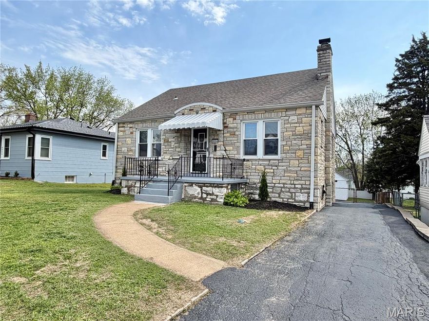 Welcome home to this charming 1.5-story stone beauty that perfectly blends rustic character with modern updates. Ideally located near shopping, dining, and major highways, this 4-bedroom, 1-bath home offers both convenience and timeless appeal Step inside to a spacious living room featuring a stunning stone fireplace, rich hardwood flooring, and unique stained-glass accents that add warmth and personality. Arched windows and doorways enhance the home’s architectural charm, while a quaint entry foyer creates an inviting first impression. The updated eat-in kitchen is both stylish and functional, complete with a farmhouse sink, center island, and a professional-grade luxury stove—perfect for cooking and entertaining.
The main level offers two generously sized bedrooms with extra closet space and a beautifully updated full bath that maintains the home’s original character. Upstairs, you’ll find two additional bedrooms, ideal for family, guests, or a home office. The walk-out lower level is unfinished, providing excellent potential to expand your living space and build equity. Outside, enjoy a fenced backyard, spacious deck, and a 2-car garage—perfect for relaxing or entertaining. With numerous updates throughout, this home is a rare blend of charm, space, and opportunity. Don’t miss your chance to make it yours!