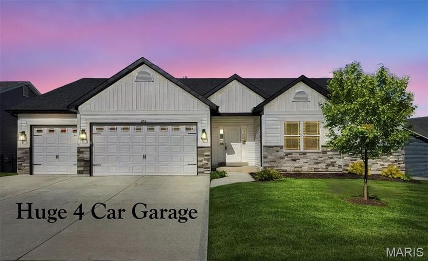 HUGE 4 CAR GARAGE!!! Welcome home to this "2 year NEW" stunning 4 bedroom, 3 full bath ranch perfectly nestled on a quiet cul-de-sac in the highly sought after subdivision of Timber Trace. One of the few homes in the neighborhood with a finished tandem 4 CAR garage!! Desirable open floor plan with finished walkout lower level.  9 ft to 11 ft ceilings throughout.  The kitchen is beautifully appointed with stainless steel appliances, granite countertops, 42 inch custom cabinets with crown molding, large oversized center island, and a walk-in pantry. The breakfast room opens through a glass slider to your maintenance free composite deck. The primary suite provides a relaxing feel with tray ceiling, master bathroom suite with dual sinks, walk in shower, and a spacious walk-in closet. Two additional bedrooms, a full bath, and a convenient main floor laundry room complete the main level. The finished walk out lower level is an entertainer's dream! Huge rec/living room, additional 4th bedroom and 3rd full bathroom, bonus office with French doors, and still plenty of room for storage in the unfinished area.  Lower level slider off of rec room leads you to the patio and partially fenced backyard. Additional upgrades and highlights include: an inground sprinkler system, upgraded siding, architectural roof, enclosed soffits, low e prairie style windows, LVP floors throughout most of the home, upgraded carpeting in bedrooms, 5 1/4 inch baseboards, Cheyenne style interior doors, granite countertops in all bathrooms, and custom blinds.  The neighborhood offers a playground and pavilion, and the home is conveniently located near highways, shopping, and everyday amenities. Why wait for new construction when this home has it all and is move-in ready!!!