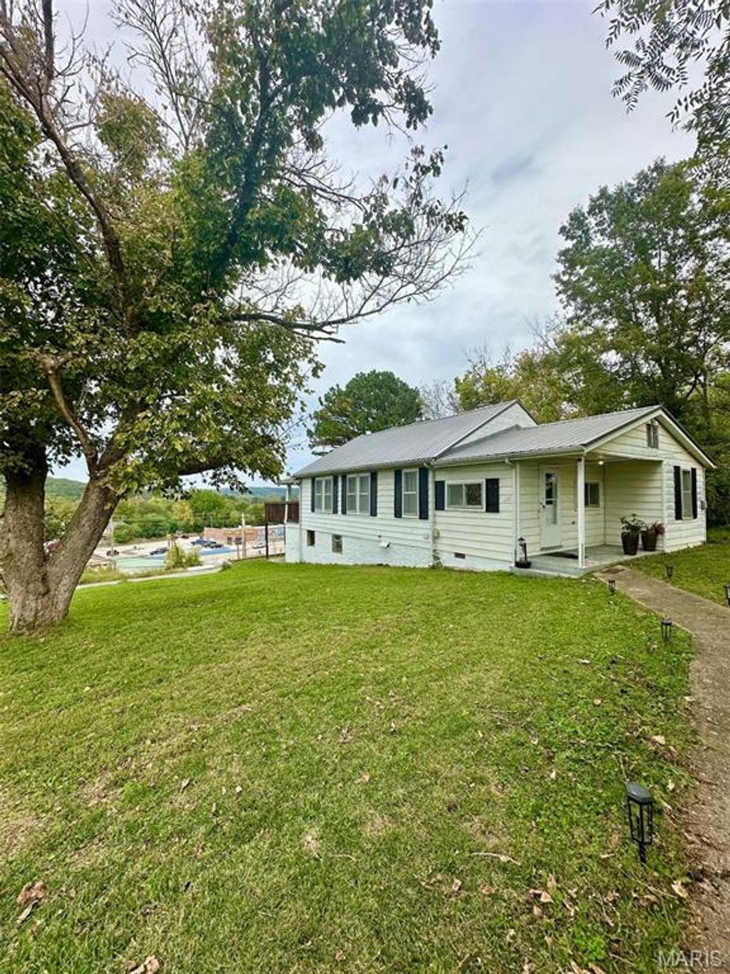 Photo of 115 Bluff Circle, Waynesville, MO 65583 (MLS # 26025162)