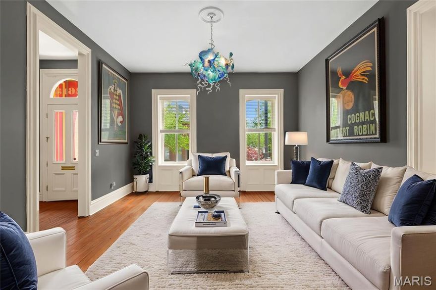 Welcome to the historic community of Soulard, where character runs deep and neighbors become friends. This beautifully restored home delivers everything you need—three bedrooms with ensuite baths, plus two half baths, a finished basement, brand new systems, roof, tuck pointing, and first floor laundry. New garage, new Astroturf for the dogs, and zero surprises. Move in and discover what makes this historic home and community so special.