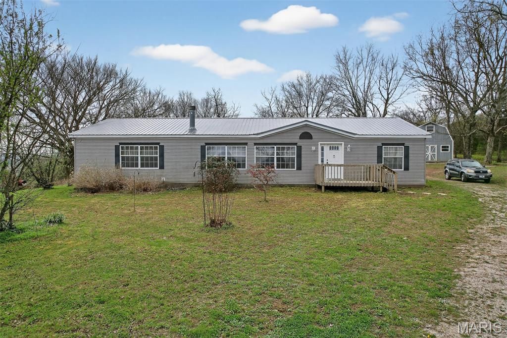 Photo of 31338 Highway 32, Lebanon, MO 65536 (MLS # 26019387)