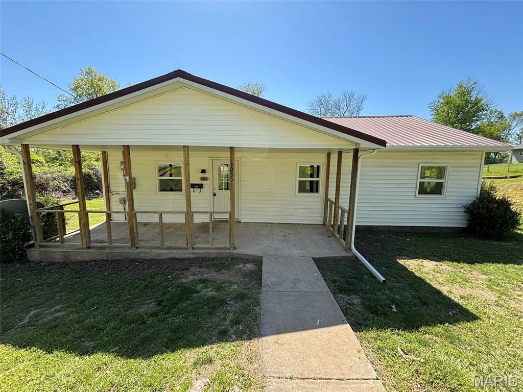 Photo of 1035 Reservoir Street, Hannibal, MO 63401 (MLS # 26023936)