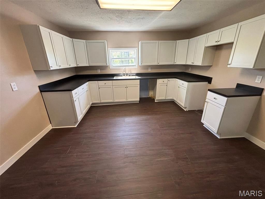 Photo of 1035 Reservoir Street, Hannibal, MO 63401 (MLS # 26023936)