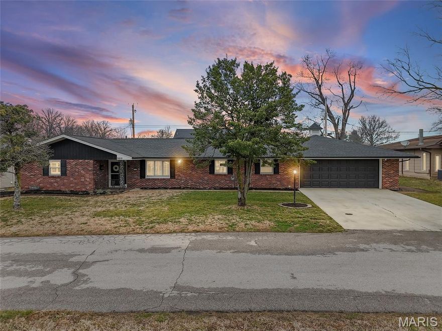 Welcome to this stunning custom-built all-brick home where timeless craftsmanship meets thoughtful modern updates. Offering 4 bedrooms and 3 bathrooms, this home is filled with warmth, character, and a layout designed for both comfortable everyday living and entertaining. Engineered hardwood floors flow throughout the main living areas and are complemented by custom built-ins, craftsman-style details, and inviting brick accents that add depth and personality throughout the home. Ideally located near the golf course with convenient access to highways, schools, and shopping, this home combines charm with everyday convenience. The beautifully updated kitchen blends classic design with modern functionality and features quartz countertops, crown molding, custom cabinetry with pull-out storage, double pantry cabinets, and a striking brick accent wall that highlights the home’s character while still feeling fresh and current.
Just off the kitchen is a versatile bonus room that can function as a sitting room, office, or dining room and offers direct access to the backyard. The spacious primary suite is filled with natural light and features five closets along with an updated ensuite bathroom. One guest bedroom also includes its own private bath, offering great flexibility for guests or multigenerational living. Additional highlights include a dedicated office or flex room with a built-in safe and filing storage, a large laundry room with built-in cabinetry and a utility sink, and an oversized fully insulated two-car garage with new insulated garage doors. Step outside to your private backyard retreat featuring premium maintenance-free wood-grain composite fencing, a 30-foot saltwater pool with slide (2021), and a spacious composite deck perfect for entertaining.
Recent updates include a new roof and gutters (2023), new carpet, new electrical panel, all new windows, and a new HVAC system (2025). Other notable features include two water heaters, central vacuum system, two ensuite bathrooms, and abundant storage throughout.