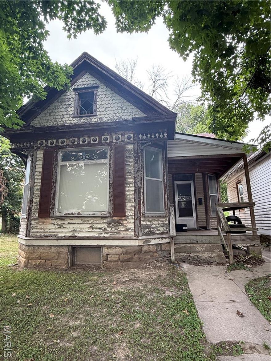 Nestled at 2014 Chestnut St, this bungalow presents an opportunity to own a piece of history. Built in 1900, this home awaits its next chapter. Bring your ideas and come make this property your next home or investment opportunity! Property is being sold as-is.