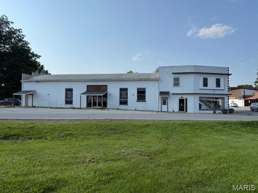 Commercial Building with Highway 89 Frontage in Belle

This expansive commercial building boasts two distinct retail spaces and three rental apartments. The front of the building features a spacious retail area with a single restroom. In the center, there is a commercial room with 2 restrooms and a large kitchen area. Additionally, there is a spacious two-bedroom, one-bathroom apartment upstairs. Ground level apartments include two, one-bedroom, one-bathroom units. All apartments are equipped with stoves, refrigerators, and washer/dryer hookups. This property offers a multitude of potential uses.